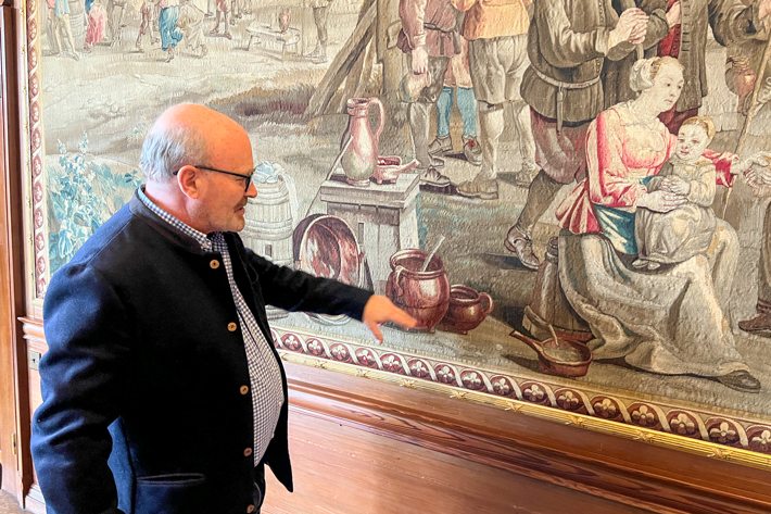 Lord Digby discussing tapestry at Minterne House
