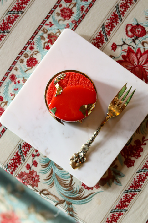 above shot of the Red Carnation red velvet cake and fork